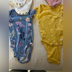 Girl New Born short sleeve onesies (9 pieces)
